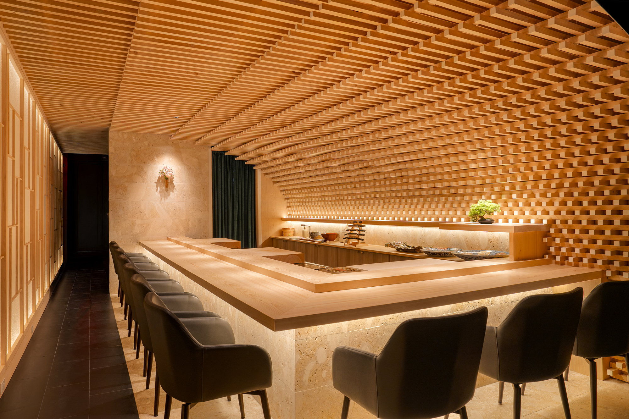 The Wooden Wave — dining space of TAKAY Miami with flowing wooden ceiling, designed by KTX archiLAB.